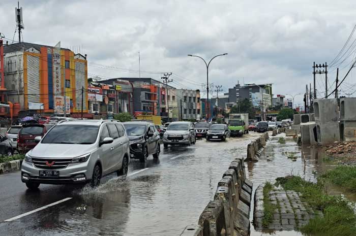 Hujan, Palembang Dikepung Banjir