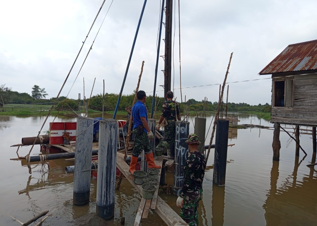 Pembangunan Jembatan Gantung Desa Embacang OKI Tunjukkan Progres Signifikan 