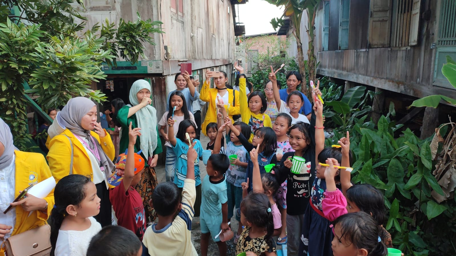 FKM Unsri Gelar Penyuluhan Keliling Kampung Bebas Budak Stunting dan Wasting di Bantaran Sungai Musi