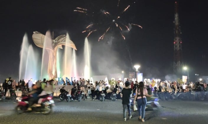 Perayaan Malam Pergantian Tahun di Bundaran Air Mancur Jakabaring Kondusif, Penjual Jagung Bakar Panen Rejeki