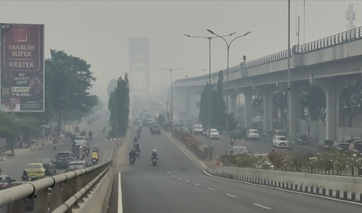 Palembang Darurat Kabut Asap, Jembatan Ampera Hilang Ditelan Pekatnya Asap