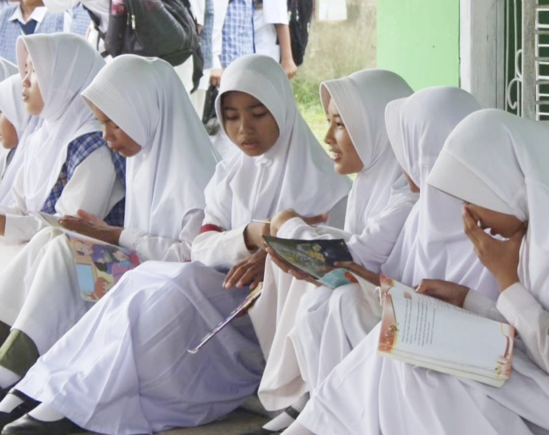Keliling ke Desa-Desa, Dinas Perpustakaan Ogan Ilir Sosialisasikan Gemar Membaca di Kalangan Pelajar