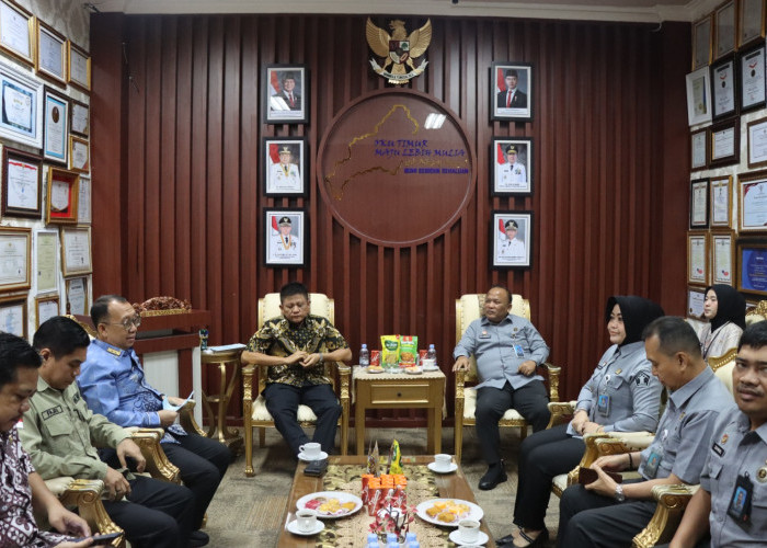 Kakanwil Kemenkum Sumsel Audiensi dengan Bupati OKU Timur, Perkuat Komitmen Bantuan Hukum bagi Masyarakat