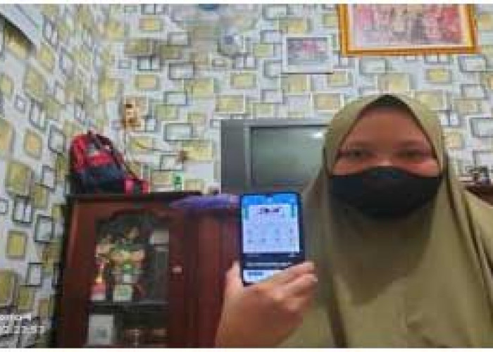 Oktari Peserta dari Prabumulih Beberkan Kemudahan Gunakan Aplikasi Mobile JKN 