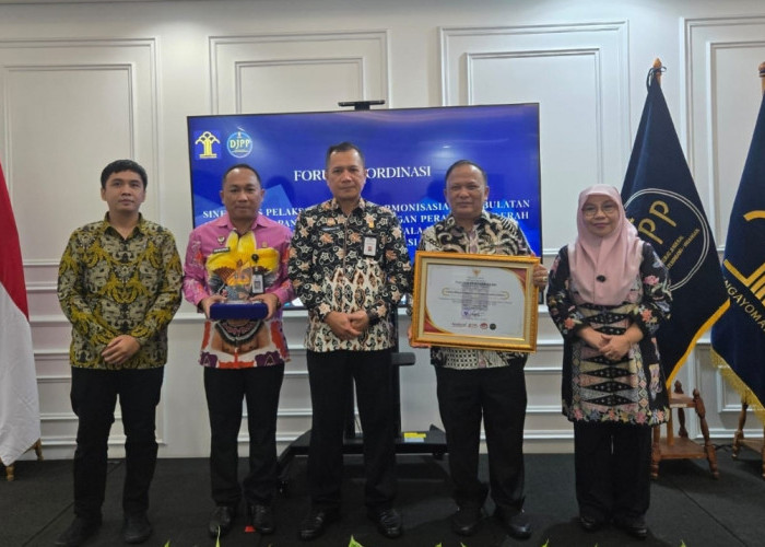 Kanwil Kemenkum Sumsel Dinobatkan sebagai Terbaik I Legislasi Daerah 2025