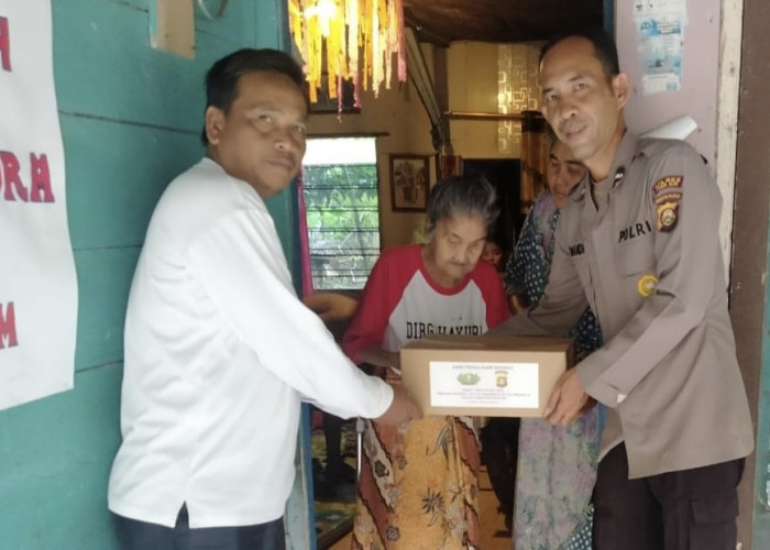 Logistik Polres Ogan Ilir Distribusikan Bansos ke Warga Desa Pulau Semambu