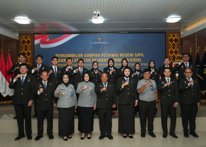 Lantik Pegawai Fungsional  dan CASN, Kakanwil Kemenkum Sumsel Minta Jajaran Pegang Teguh Tata Nilai BerAKHLAK
