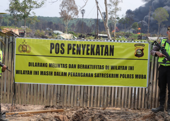 Cegah Warga Masuk, Polisi Buat Perimeter di Sekitar Lokasi Sumur Minyak Ilegal Sungai Parung yang Terbakar