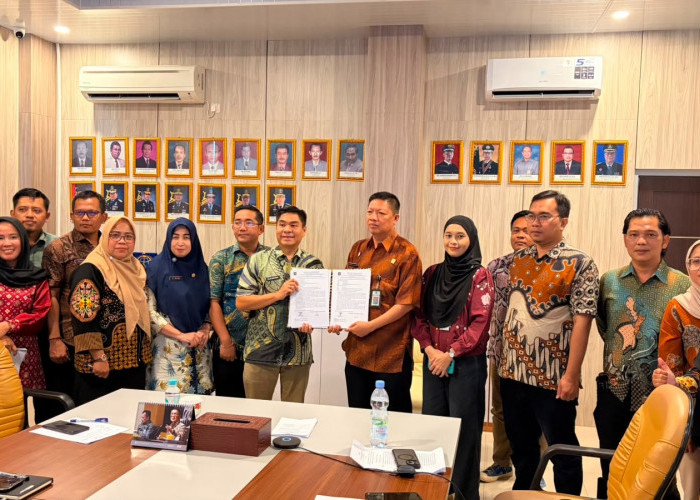 Kanwil Kemenkum Sumsel dan Pemkab OKU Timur Bahas Harmonisasi Dua Raperbup Strategis