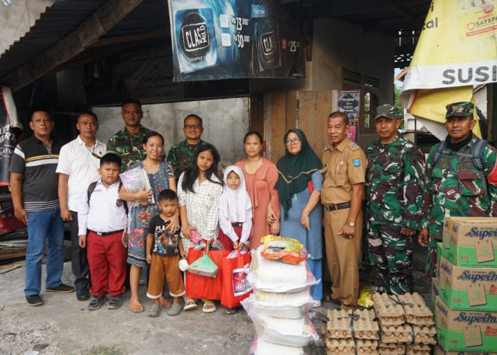 Kodim 0402/OKI Berikan Bantuan ke Korban Musibah Kebakaran di Desa Serinanti OKI 