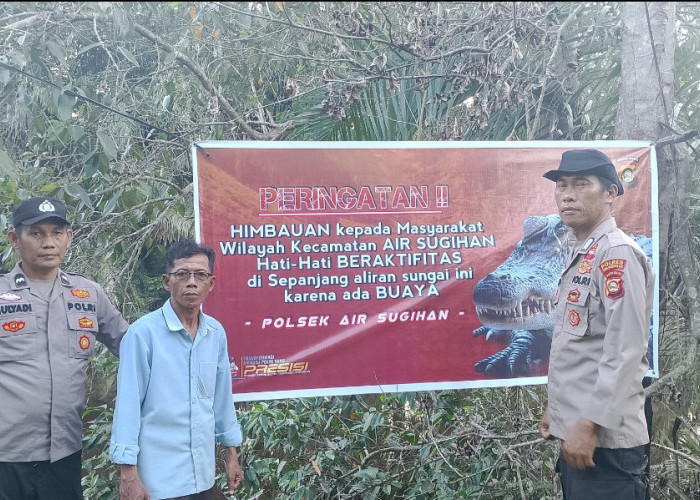 Banyak Buaya Liar di Sungai, Polsek Air Sugihan Pasang Spanduk Imbauan di 5 Desa