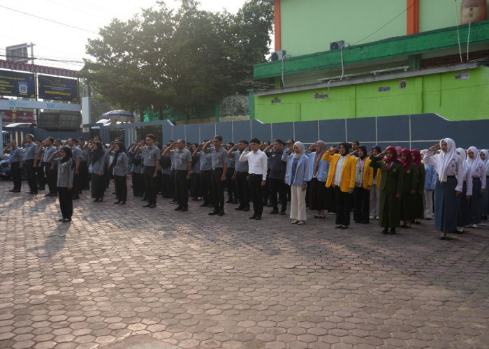 Tingkatkan Disiplin ASN, Apel Pagi Kemenkum Sumsel Apresiasi Pegawai Lulus Uji Kompetensi