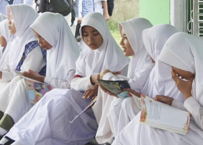 Keliling ke Desa-Desa, Dinas Perpustakaan Ogan Ilir Sosialisasikan Gemar Membaca di Kalangan Pelajar