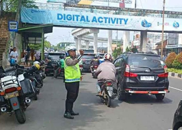 Sering Terjadi Kemacetan Kasat Lantas Tempatkan Personil Di Depan SD Muhammadiyah 6 Palembang