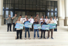 Pemkab OI Berikan 250 Marbotnya Perlindungan JKN