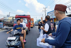 Peduli Kesehatan Masyarakat, Forum Cakar Sriwijaya Ogan Ilir Bagikan Masker dan Nasi Kotak
