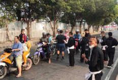 Masker dan Vitamin Dibagikan Warga PSHT Ranting Kayuagung ke Masyarakat