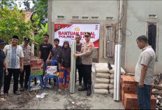 Polsek SP Padang Berikan Bantuan Bahan Bangunan ke Korban Kebakaran di Desa Tanjung Alai 