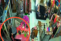 Seorang Wanita Pakai Gamis Datang ke Butik, Kelincahan Tangannya Kepergok Selipkan Tas ke Sela Kedua Kaki