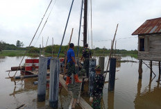 Pembangunan Jembatan Gantung Desa Embacang OKI Tunjukkan Progres Signifikan 