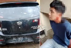 Pria Ini Diamuk Massa Saat Bawa Kabur Taksi Online di Jalan Sukabangun Palembang