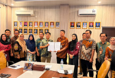 Kanwil Kemenkum Sumsel dan Pemkab OKU Timur Bahas Harmonisasi Dua Raperbup Strategis