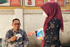 AHASS Sumsel Bagikan Masker Gratis di Tengah Kabut Asap